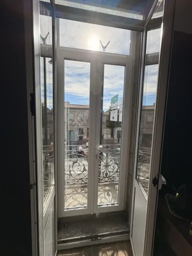 Installation d'une porte-fenêtre en PVC à Talence, Bordeaux, RENOVISOL 33